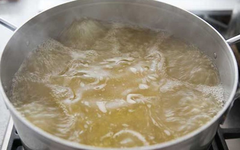 Clean crabs, char onion and ginger, and toast spices 4-5 hours before serving for the best crab pho