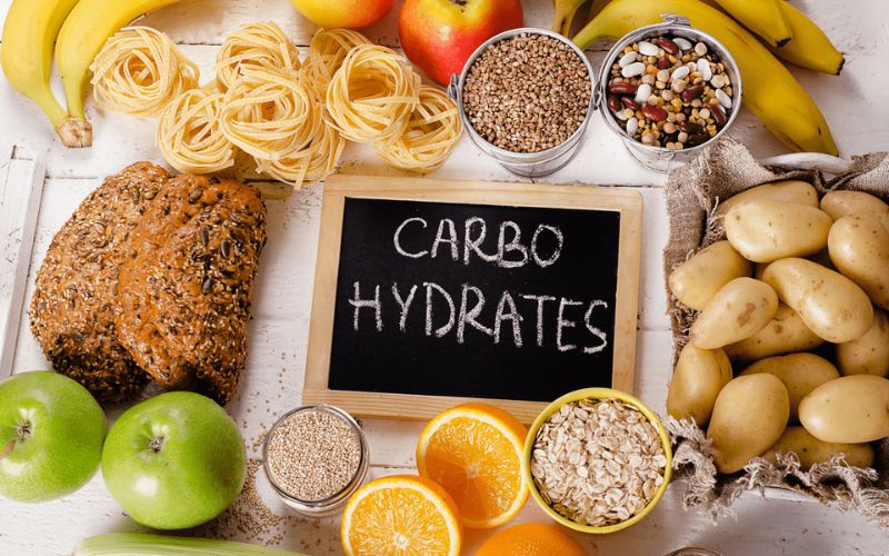 Carbs fuel the body—too little causes fatigue, so eat whole grains, fruits, and veggies