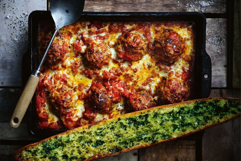 Meatballs in tomato sauce in oven