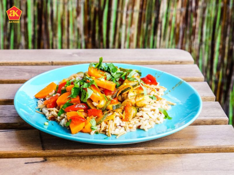 Grilled peach, rice & arugula salad