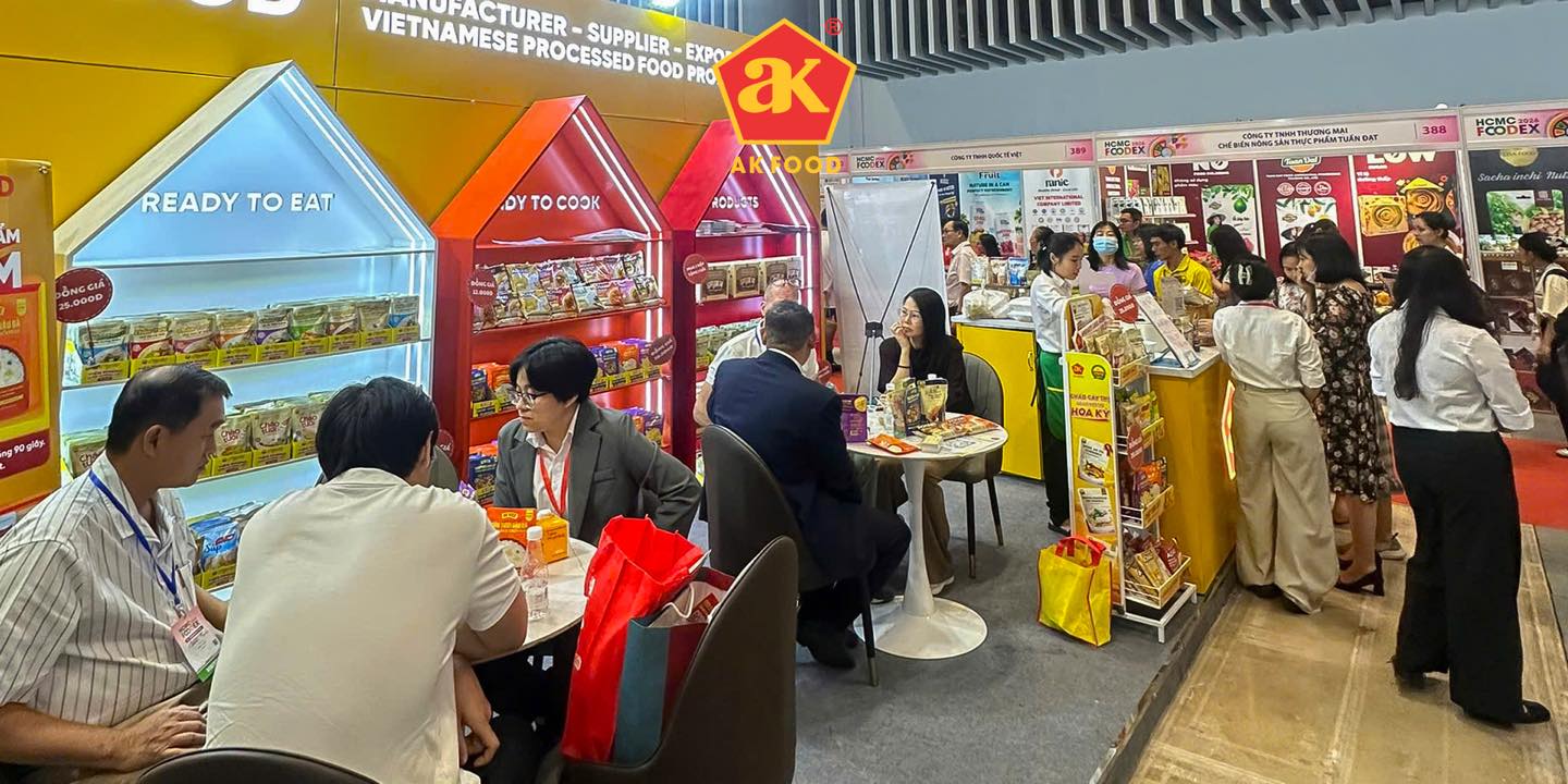 A vibrant trading atmosphere at the AK FOOD booth at FOODEX 2026